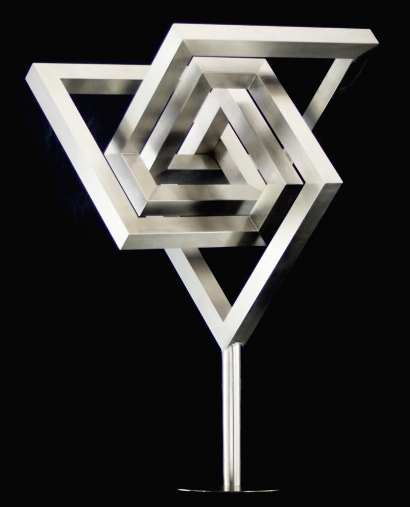 Geometric stainless steel sculpture with triangular frame structure on pedestal